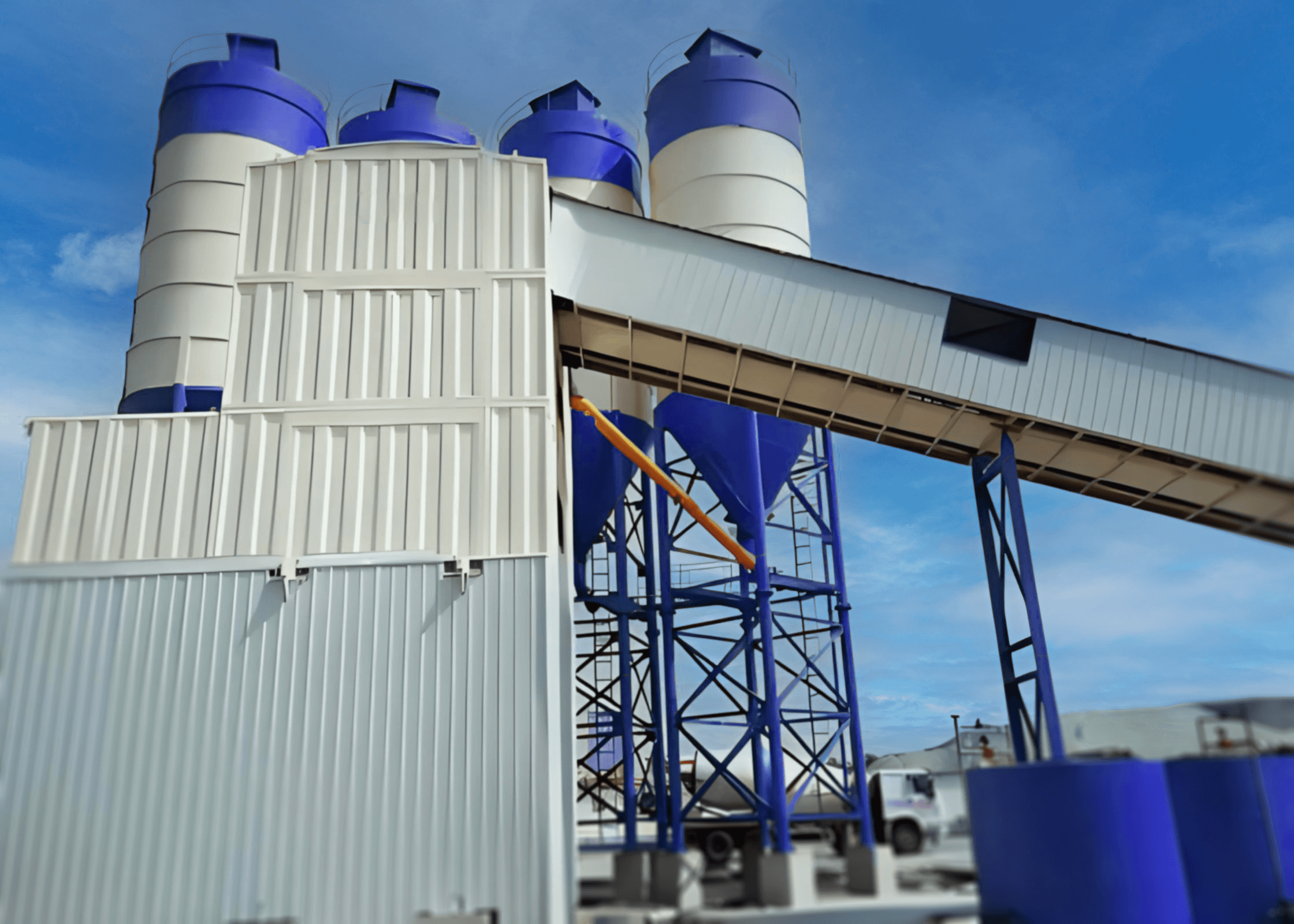 Winter concrete batching plant equipment access with aggregate conveyor mixer platform insulated pipework and control cabinet vents