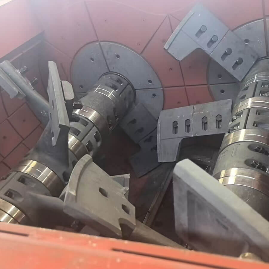 Twin shaft concrete mixer service hatch with liner plates blade arms bolts spare wear parts torque tools and access stairs